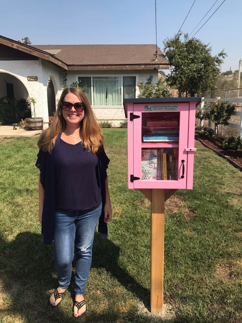 Pink Little Free Library Impact Library Program Steward Stories, June 2023 - Little Free Library